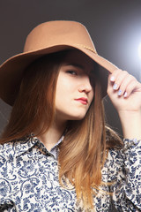 Model in hat
