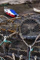 Fototapeta na wymiar Mesh net shellfish traps at sea port