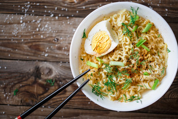 Asian noodles with fresh green onion and boiled egg