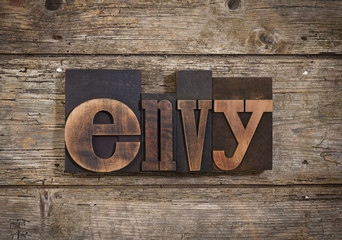 envy written with letterpress type