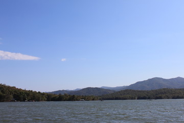 The reservoir is surrounded by mountains