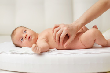 Obraz na płótnie Canvas Newborn baby massage