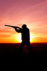 Rolgordijnen Hunter in Sunset © equigini