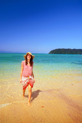 Young woman on tropical beach