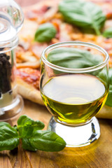 Fresh pizza served on wooden table