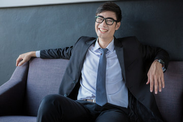 Businessman sitting on sofa