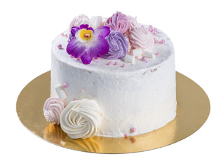 orchid flower on the cake with white cream and marshmallows on a