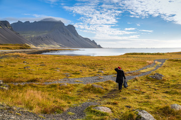 Fototapeta premium Woman traveler walk among beautiful landscape