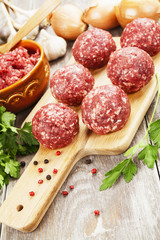 Raw meatballs on the table