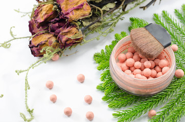 blusher ball on green leaves and dried red rose