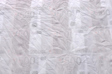 abstraction made ​​of white fabric and euro money