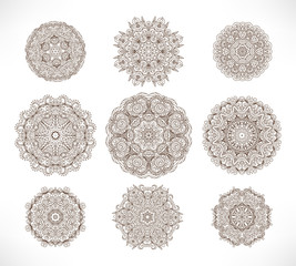 Set of nine ornate circle (mandala) - traditional indian tattoo henna design. Mehendi vector in ethnic style