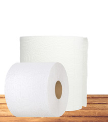 Fototapeta premium rolls of toilet paper on table isolated on white