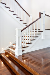 Stairs and glossy wooden floor of beautiful attractive luxury ho