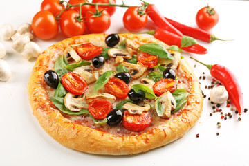 Delicious tasty pizza with vegetables on light background