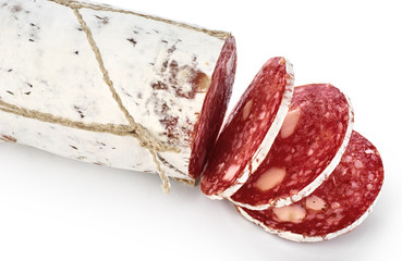 Dried salami with white mold isolated on white background.