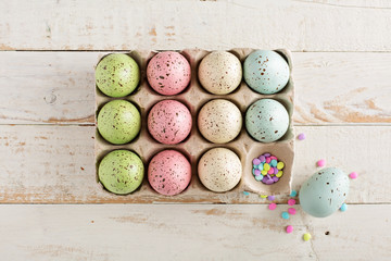 Easter background with pastel colorful eggs 