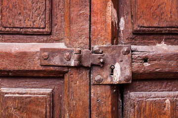 door with a keyhole and latch