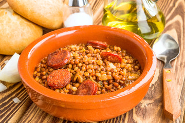 earthenware dish with homemade lentil stew