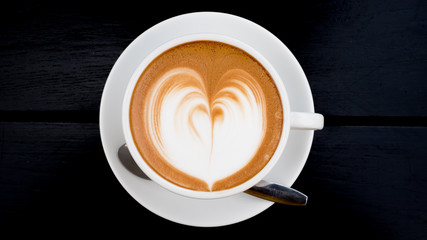hot mocha in a white cup on table