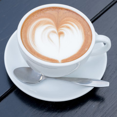 hot mocha in a white cup on table
