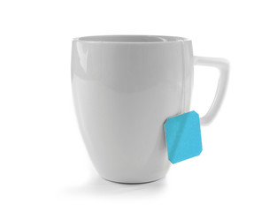 Cup of tea isolated on white background. Teabag with blue label