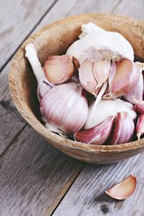 Garlic on a rustic wooden table.Selective focus 