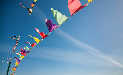 Flags against the blue sky