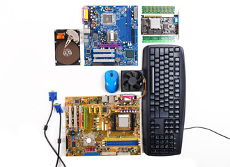 Computer parts with keyboard and mouse, isolated on white