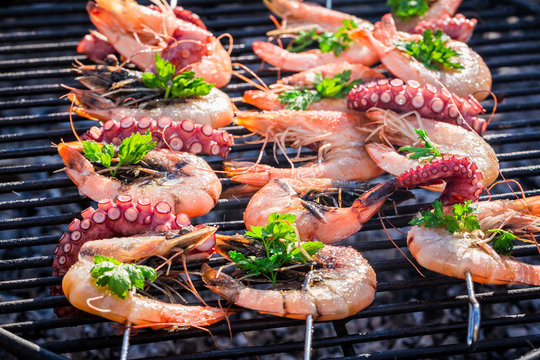 Fresh seafood with lemon and parsley for grilling