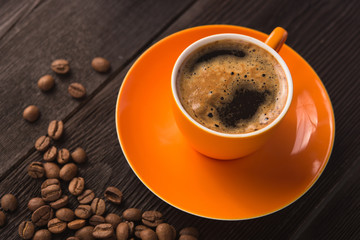 Orange cup of coffee