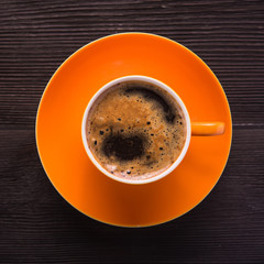 Orange cup of coffee