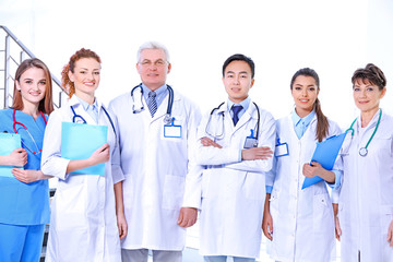 Fototapeta premium Team of smiling doctors indoors