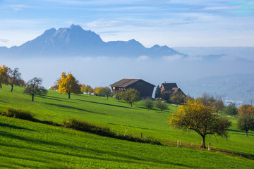 Amazing Landscape of Mount Pilatus and Lake Lucerne covered with frog, Alps, Switzerland