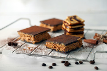 Few delicious chocolate cakes on light background