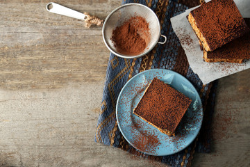 Few delicious chocolate cakes on wooden background