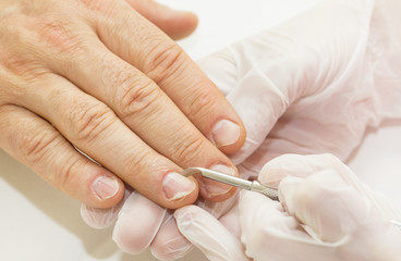 Obraz na płótnie Canvas the process of the male manicure in a beauty salon