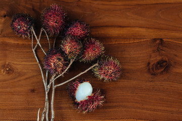 Rambutans closeup on wooden table