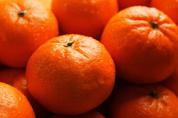 Fresh tangerines background, close up