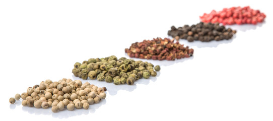 Mix peppercorn variety over white background