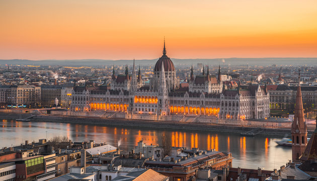 Illuminated Hungarian Parliament Building in Budapest, Hungary at Sunrise
