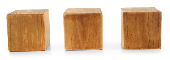 Three blank wooden cubes isolated on white