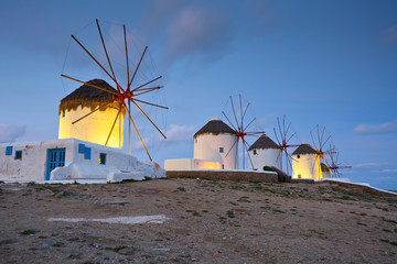 Old traditional windmills over the town of Mykonos.