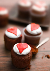 Cupcakes on wooden background