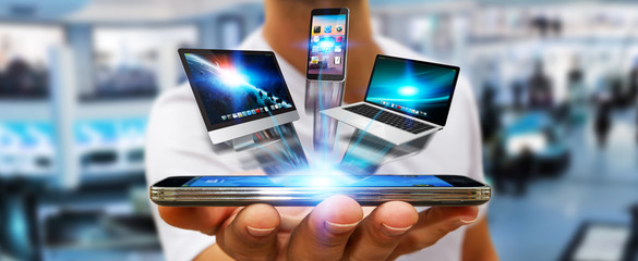 Businessman holding tech device in his hand