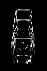 Glasses for cocktails on black background