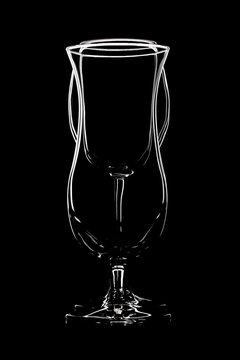 Glasses for cocktail and wine on black background