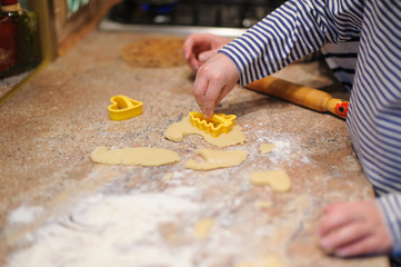 Kid making homemade cookies