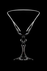 Glass for cocktail on black background
