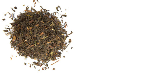 Loose dried darjeeling black tea leaves over white background